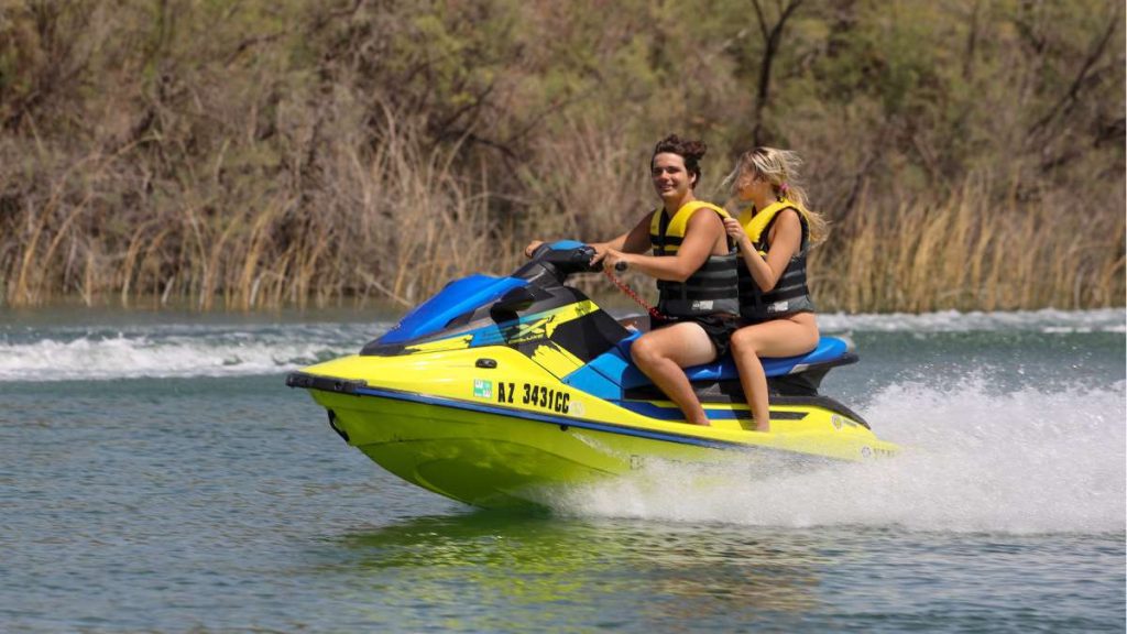 Man And Woman Enjoying Jet Ski Ride in Lake Havasu