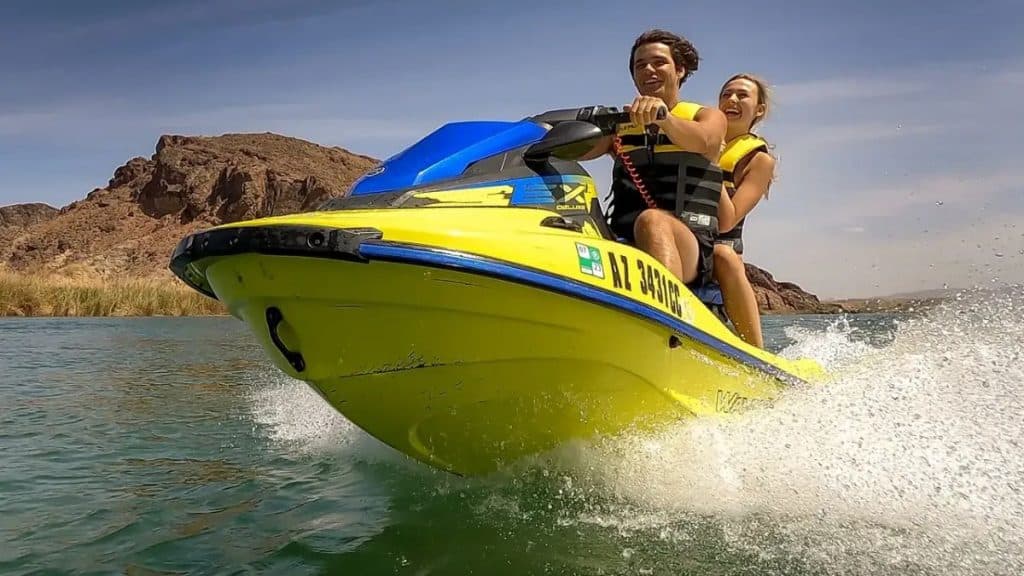 Man And Woman On A Jet Ski