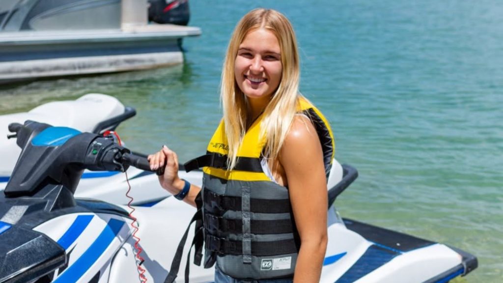 Woman With Jet Ski Smiling
